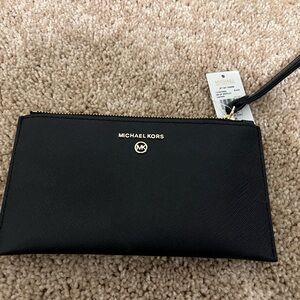 Micheal Micheal Kors black jet set charm small wristlet new with tags